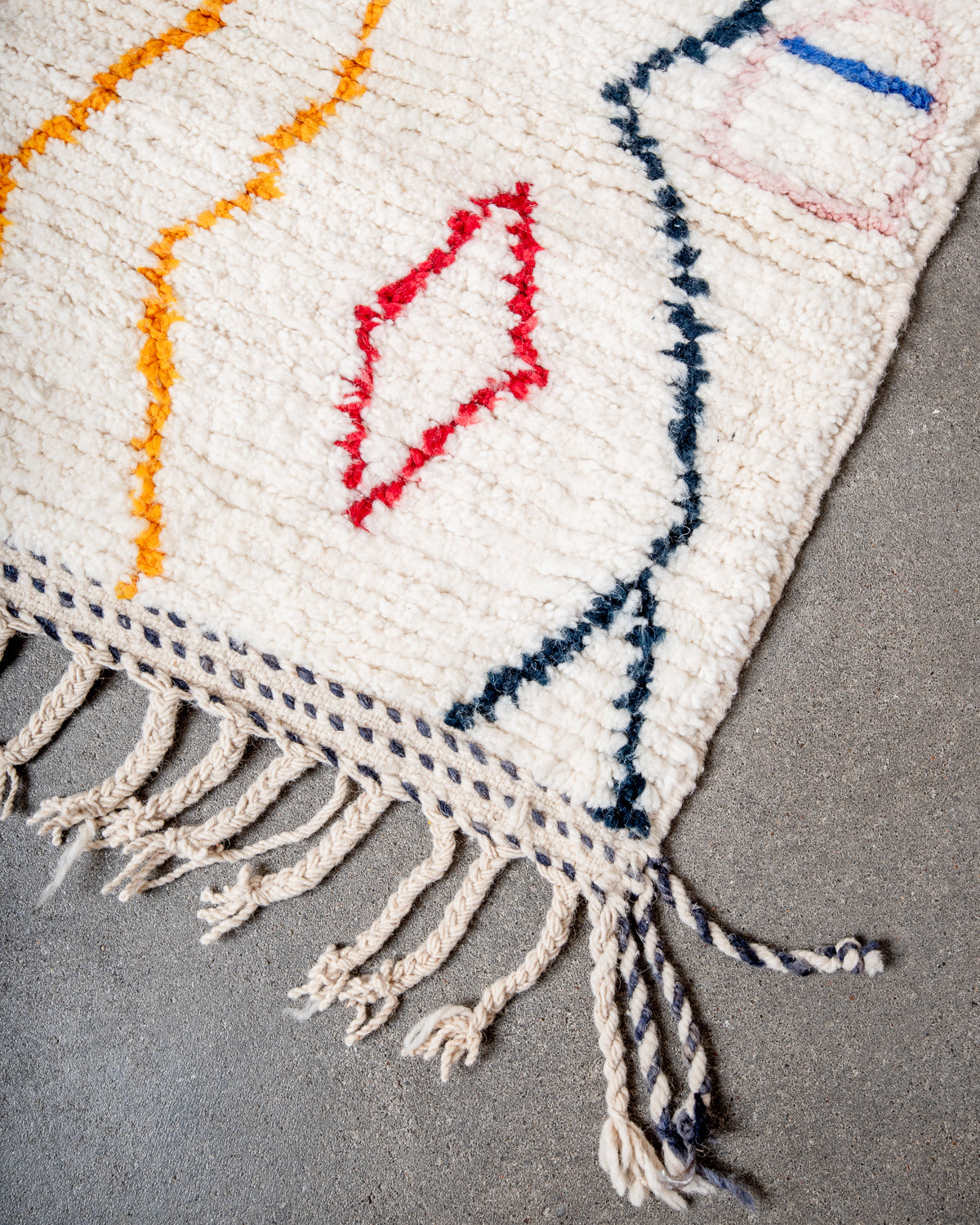 Modern, designer, handcrafted Berber rug from Morocco. Beniourain carpet with beautiful colours and patterns and fluffy wool texture.
